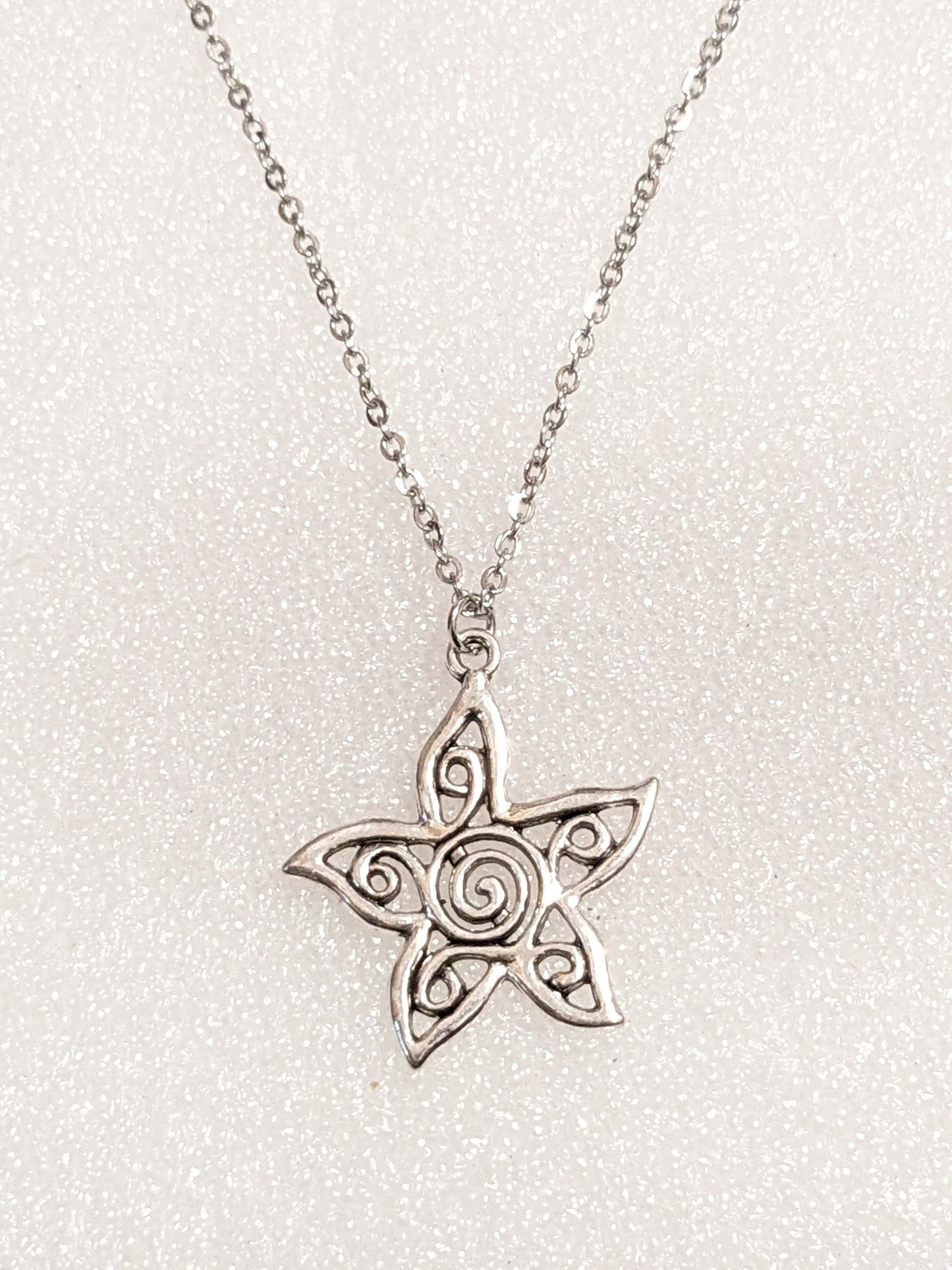 Starry twirl necklace