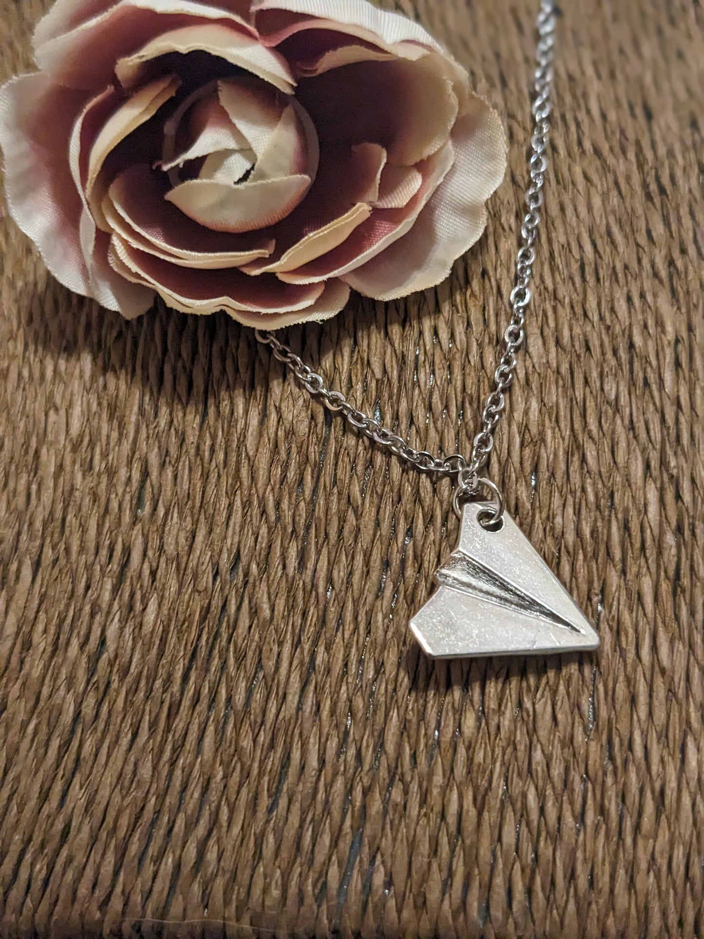 Paper airplane necklace